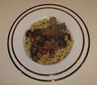 Beef bourgignon over noodles